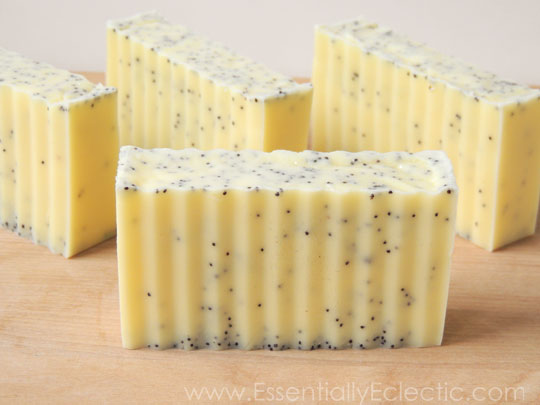These lush lemon poppy seed soap bars are made with cocoa, shea & mango butters! Check out how to make them yourself with this easy tutorial. | DIY Bath and Body | How to make soap without lye | Soap Making | Mom Makes Joy