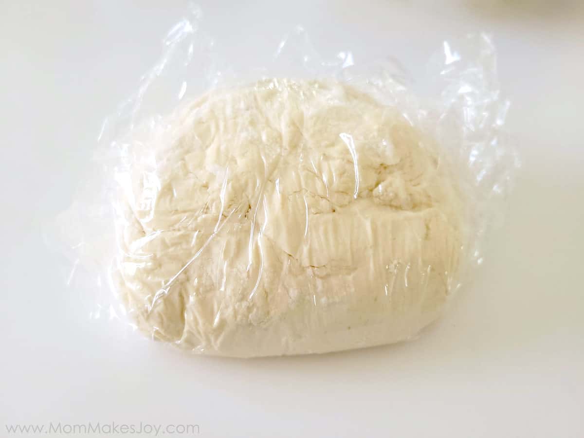 Let your dough rest in saran wrap to seal in the moisture.